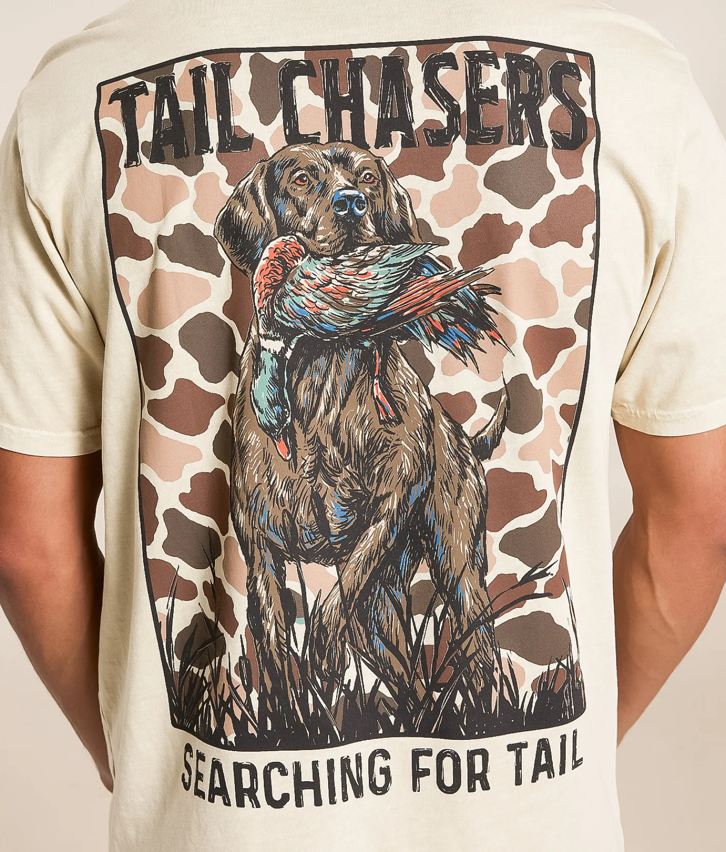 Tops|Graphic T-Shirts | Tail Chasers Club Searching T-Shirt Ivory
